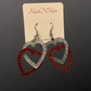 Impossible heart dangle earrings