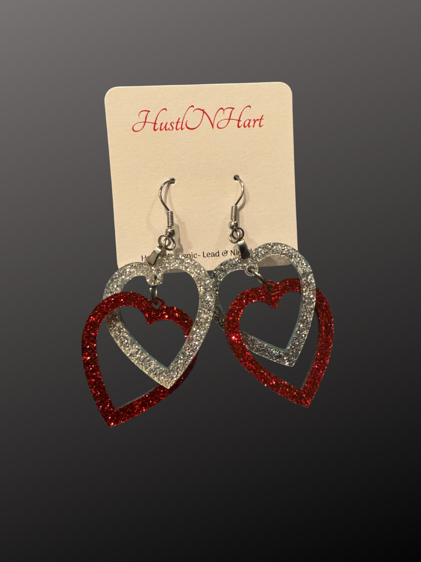 Impossible heart dangle earrings